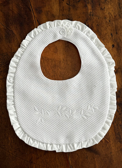 PIQUET BIB WITH FLOWER EMBROIDERY